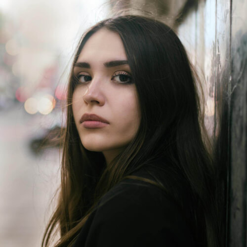 close up photo woman with black top